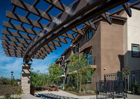 Outdoor courtyard with trellis with apartment building -Parque Vista, Los Angeles, CA