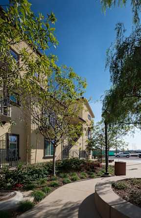 Apartment exterior with walkways and landscaping