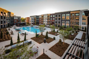 an aerial view of the courtyard and pool at the bradley braddock road station apartments
