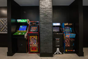 a group of arcade games in a room