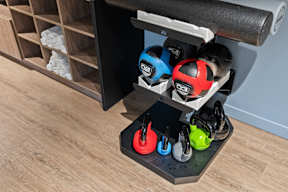 a toy shelf with helmets and other toys on it at Hue Apartments, Redmond , WA