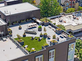 an aerial view of a building with a green roof at Hue Apartments, Redmond , 98052