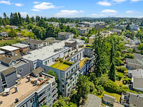 A bird's eye view of a residential area with houses and apartments.