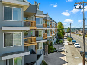 a row of apartment buildings on a city street