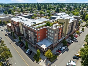 an aerial view of an apartment building in a city