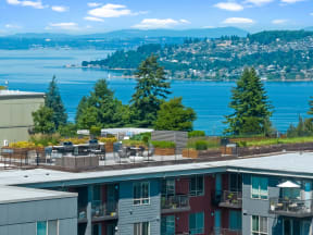 a view of a lake from a apartment building overlooking a city