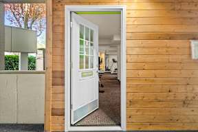 the door to the office is open to the living room