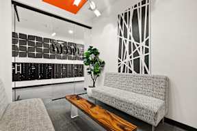 a living room with a couch and a table