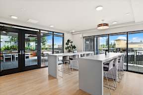 the preserve at ballantyne commons cyber cafe with a large white table and chairs