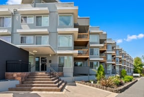 an image of a building with stairs in front of it
