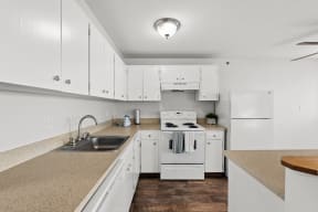 the preserve at ballantyne commons apartment kitchen with white appliances