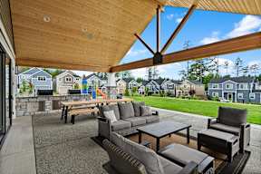 A patio with a table and chairs is shown.
