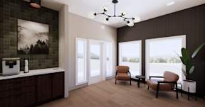 A modern living room with brown wooden floors and a large window.