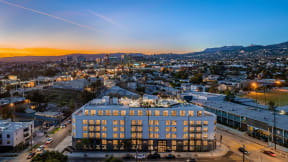 an aerial view of a building in the city