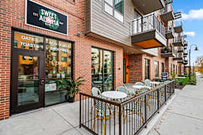 A building with a sign that says "Sweet Aloha" is shown.