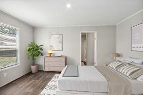 Model bedroom at Southfork MHC in Belton, MO