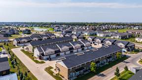 A large residential complex with multiple houses and apartment buildings.