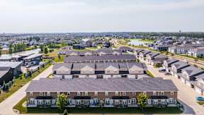 A large residential complex with multiple houses and apartment buildings.