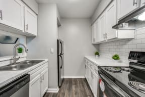 Fully Furnished Kitchen at Bellaire Oaks Apartments, Texas