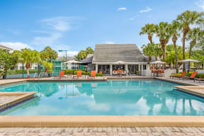 Resort style pool with large sundeck with plenty of lounge areas