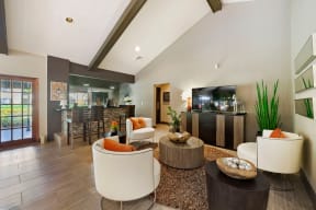 Leasing office with seating area and tables
