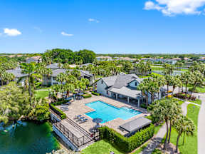 A large house with a pool in the backyard.