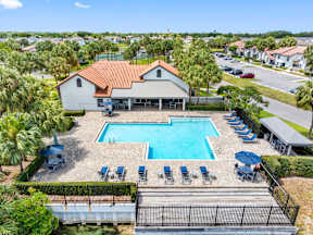 A house with a pool in the backyard.