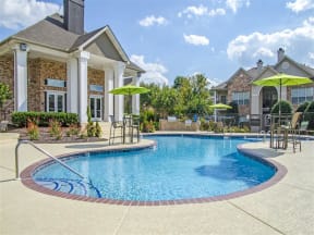 Apartments for Rent in Franklin, TN - Harpeth River Oaks - Pool with Jacuzzi, Umbrella Tables, and Lounge Chairs