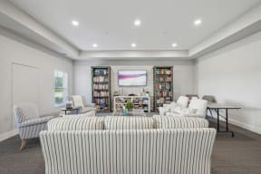 a living room with a couch and chairs and a table at The Hendrickson, Falcon Heights, 55113