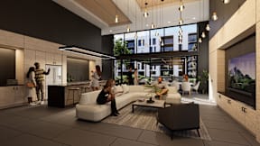 A modern living room with people sitting and standing around.