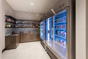 A modern kitchen with a large refrigerator and wooden cabinets.