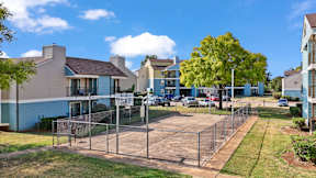 A residential area with houses and a playground.