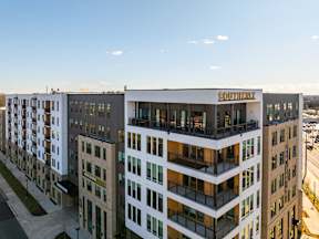 A modern multi-story building with the name "SOUTHERN" on the top floor.