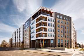 A modern multi-story building with the name "SOUTHERNITY" on the top.