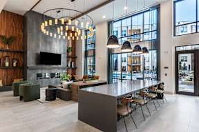 A modern interior with a bar and seating area.