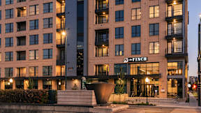 A modern building with the name "FINCH" on the front.