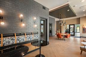 A modern dining area with a black and white theme.