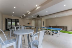 Community Game Room with ping pong tables at Residences at 3000 Bardin Road, Texas