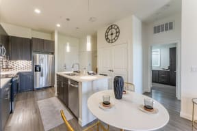 Well Equipped Kitchen And Dining at Residences at 3000 Bardin Road, Grand Prairie, TX
