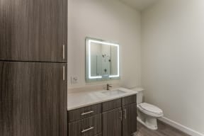 Renovated Bathrooms With Quartz Counters at Residences at 3000 Bardin Road, Texas