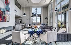 a living room filled with furniture and a large window at Republic at Alamo Heights, Texas
