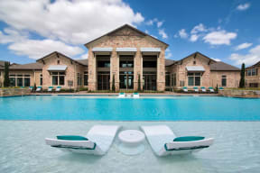 Poolside Sundeck With Relaxing Chairs at Seville at Clay Crossing, Texas