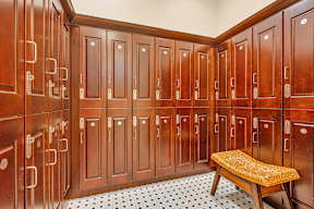 The Monmouth, Manasquan NJ - A room with wooden lockers and a bench.