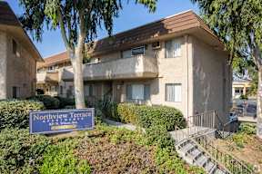 A building with a sign that says Northview Terrace in front of it.