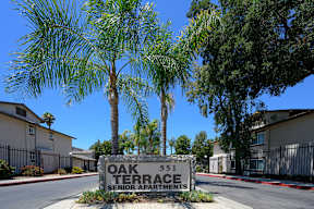a sign that says oak terrace senior apartments at Oak Terrace Senior Apts, California