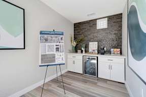 the preserve at ballantyne commons community room with counter and refrigerator and bulletin board at Sunnymead Apts Apartments, Moreno Valley