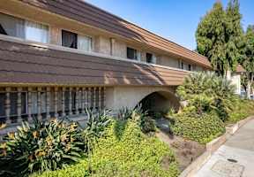 a building with a garden in front of it at North View Terrace, Montebello California