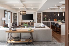 a living room with a couch and a table