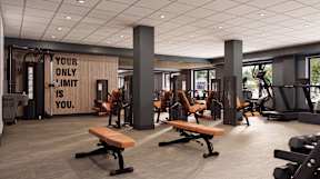 A gym with a sign that says "Your only limit is you."