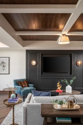 a living room with a couch and a tv